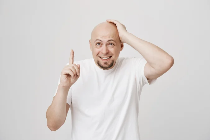 What causes a bald spot on the crown?
